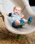 Young toddler boy child playing on slide