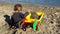 Young toddler playing with sand