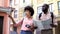 Young tourist couple with map and photo camera, choosing direction, travel