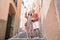 Young tourist couple traveling on european holidays outdoors in italian vacation in Cinque Terre