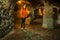 Young tourist woman explore ancient Derinkuyu underground cave city