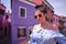 Young Tourist Woman In Old Italian colorful Town