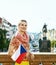 Young tourist woman in Prague Czech Republic with Czech flag