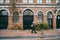 Young tourist woman walk at background of traditional old buildings in Amsterdam, Netherlands