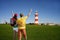 Young tourists near Plymouth lighthouse, UK