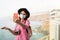 Young travel woman taking selfie with mobile smartphone wearing face surgical mask - Travel influencer having fun in vacation