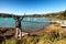 Young traveler admiring the view of Akaroa, New Zealand