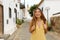 Young traveler girl visits small colonial village of Betancuria, Canary Islands, Spain