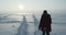 Young traveller goes through a blizzard at beautiful sunset. Polar expedition