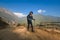 Young traveller trekking on forest trail , Nepal