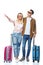 young travelling couple with suitcases pointing somewhere