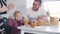 Young unrecognizable woman bringing orange juice for little daughter and smiling husband. Caucasian mother and wife