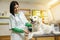 Young veterinarian with young Labrador dog