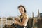 Young volunteer with a piglet, The Sanctuary at Soledad, Mojave