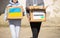 Young volunteers taking a box of food from his car for the Ukrainian refugee