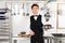 Young Waiter With Cloche Lid Cover And Tray