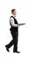 Young waiter walking with an empty tray