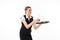 Young waitress in uniform trying to hold tray with glasses over white background