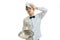 The young weary waiter holds a tray and put a napkin on his head