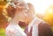 Young wedding couple on summer meadow