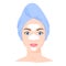 Young white woman with cosmetic mask and towel on head. Skincare procedures at home. Cosmetic clay or sheet mask. Vector