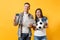 Young win couple, woman man, football fans holding bundle of dollars money, credit card, soccer ball, cheer up support