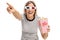 Young woman with 3D glasses and popcorn pointing and laughing