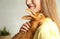 Young woman with adorable rabbit, closeup. Lovely pet