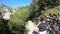 Young woman alone strolling on a path in the canyon of galamus, France