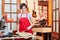 Young woman as apprentice in wood processing