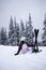 Young woman athlete posing on skis on a mountain slope. professional sportsman is skiing. winter sport