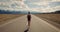 Young woman backpacker walking on road.