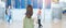 Young woman with bag and luggage looking to flight time information board in international airport, before check in. Travel,