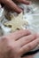 Young woman bakes crunchy crispy cookies in Christmas shapes, st