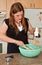 Young Woman Baking Cookies with Mixer