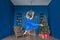 Young woman ballet dancer jumping in blue dress in a festive New Year`s interior