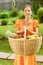 Young woman with baskets of fruit