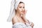 Young woman in a bathrobe and towel on her head, spa and care portrait, clean natural face