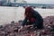 Young woman beachcombing in city