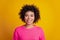 Young woman beaming shiny smile on yellow background