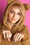 Young woman in bear suit