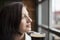 Young Woman with Beautiful Brown Eyes Drinking a Pint of Stout