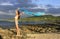 Young woman in bikini standing at Las Galeras beach, Samana peninsula