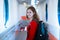 Young woman boarding an aircraft