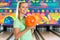 Young woman bowling having fun