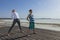 Young woman and boy doing back bending