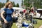 Young woman browse fair handmade wares