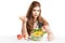 Young woman brunette present and eating salad