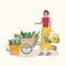 Young woman with a bucket and a cart of vegetables.