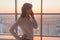 Young woman busy with calling, chatting on the cell phone side view portrait. Close-up picture of a businesswoman